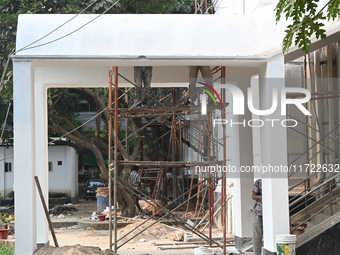 Workers renovate the main building of the International Criminal Tribunal in Dhaka, Bangladesh, on October 30, 2024. (