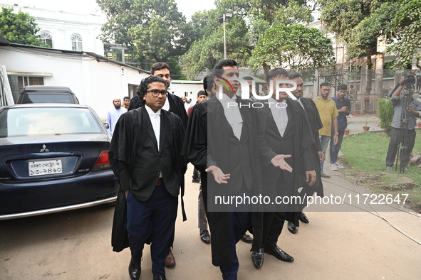 The Chief Prosecutor and other prosecutors walk in front of the International Crimes Tribunal (ICT) in Dhaka, Bangladesh, on October 30, 202...