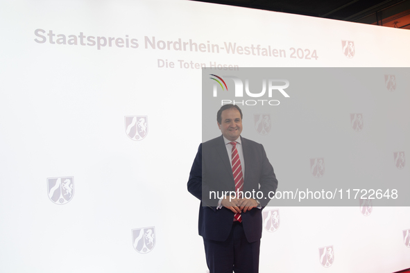 Nathanael Liminski, the state minister of international affairs, poses for pictures on the red carpet of Roncalli's Apollo Variety Theatre i...