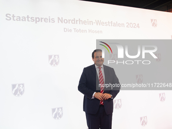 Nathanael Liminski, the state minister of international affairs, poses for pictures on the red carpet of Roncalli's Apollo Variety Theatre i...