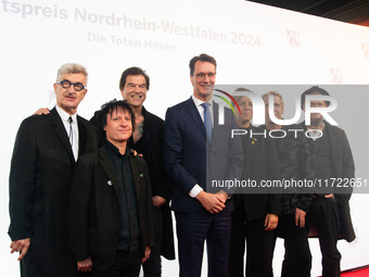 Wim Wenders, a German filmmaker, Stephen George Ritchie, Andreas Frege alias Campino, Andreas Meurer, Andrea, members of the rock band Die T...