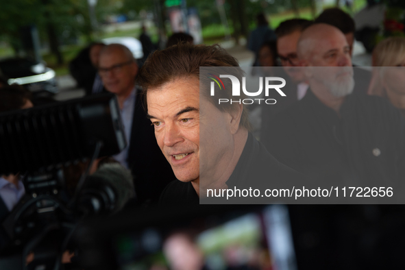 Andreas Frege, also known as Campino, a member of the rock band Die Toten Hosen, speaks to the press during the red carpet event at Roncalli...