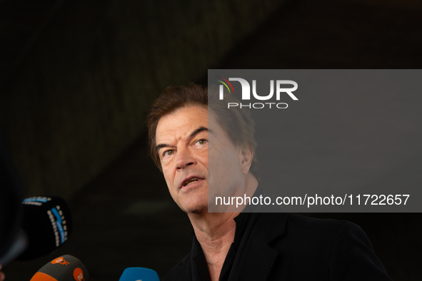 Andreas Frege, also known as Campino, a member of the rock band Die Toten Hosen, speaks to the press during the red carpet event at Roncalli...