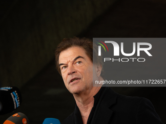 Andreas Frege, also known as Campino, a member of the rock band Die Toten Hosen, speaks to the press during the red carpet event at Roncalli...