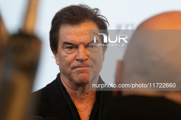 Andreas Frege, also known as Campino, a member of the rock band Die Toten Hosen, speaks to the press during the red carpet event at Roncalli...