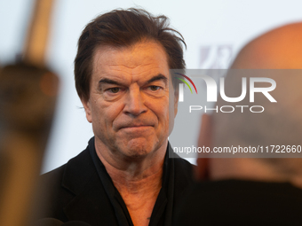 Andreas Frege, also known as Campino, a member of the rock band Die Toten Hosen, speaks to the press during the red carpet event at Roncalli...