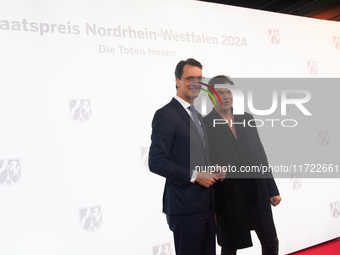 Hendrik Josef Wust, the minister president of NRW, and Andreas Frege, also known as Campino, a member of the rock band Die Toten Hosen, pose...