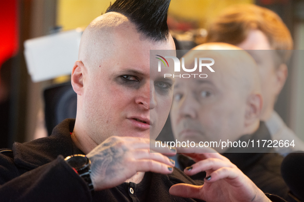 Ronald Hubner, a member of the punk band Broilers, talks to the press on the red carpet of Roncalli's Apollo Variety Theatre in Duesseldorf,...