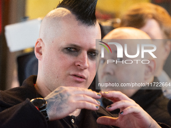 Ronald Hubner, a member of the punk band Broilers, talks to the press on the red carpet of Roncalli's Apollo Variety Theatre in Duesseldorf,...