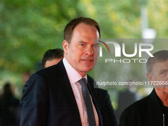 Stephan Keller, the mayor of Duesseldorf, poses for pictures on the red carpet of Roncalli's Apollo Variety Theatre in Duesseldorf, Germany,...