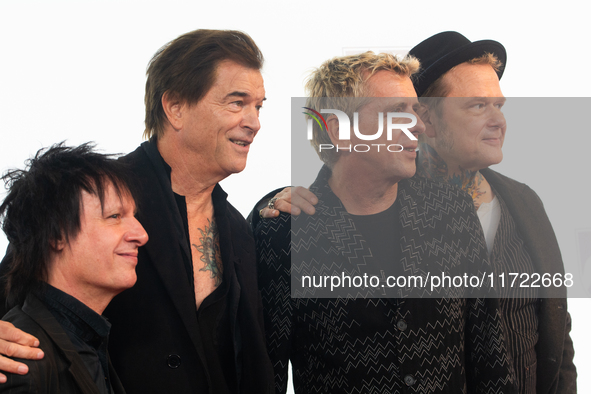 Stephen George Ritchie, Andreas Frege alias Campino, Andreas Meurer, and Andrea, members of the rock band Die Toten Hosen, pose for pictures...