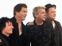 Stephen George Ritchie, Andreas Frege alias Campino, Andreas Meurer, and Andrea, members of the rock band Die Toten Hosen, pose for pictures...