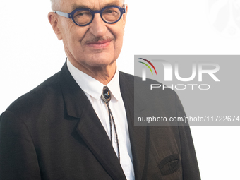 Wim Wenders, a German filmmaker, poses for pictures on the red carpet of Roncalli's Apollo Variety Theatre in Duesseldorf, Germany, on Octob...