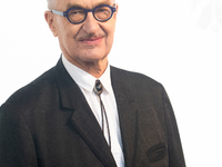 Wim Wenders, a German filmmaker, poses for pictures on the red carpet of Roncalli's Apollo Variety Theatre in Duesseldorf, Germany, on Octob...