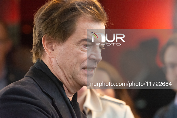 Andreas Frege, also known as Campino, a member of the rock band Die Toten Hosen, speaks to the press during the red carpet event at Roncalli...