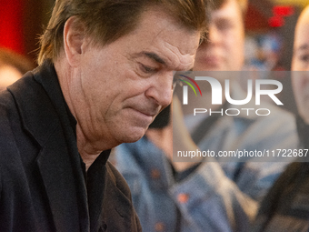 Andreas Frege, also known as Campino, a member of the rock band Die Toten Hosen, speaks to the press during the red carpet event at Roncalli...