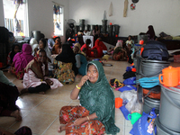 Rohingya refugees rest in a temporary shelter at the Pantai Labu District Office in Deli Serdang Regency, North Sumatra, Indonesia, on Octob...