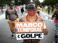 Indigenous leaders hold an act in Brasilia, Brazil, on October 30, 2024, to protest against PEC48, which defines a time frame for demarcatin...