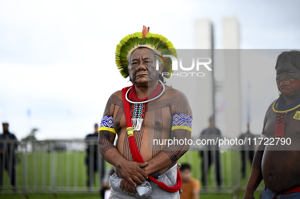 Indigenous leaders hold an act in Brasilia, Brazil, on October 30, 2024, to protest against PEC48, which defines a time frame for demarcatin...