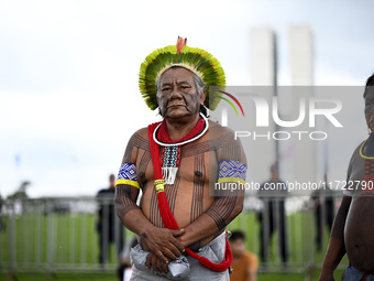 Indigenous leaders hold an act in Brasilia, Brazil, on October 30, 2024, to protest against PEC48, which defines a time frame for demarcatin...