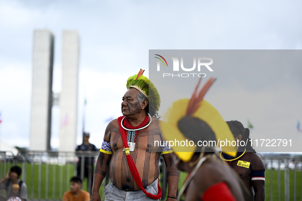 Indigenous leaders hold an act in Brasilia, Brazil, on October 30, 2024, to protest against PEC48, which defines a time frame for demarcatin...