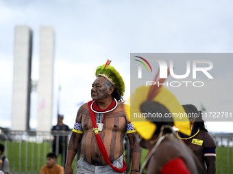 Indigenous leaders hold an act in Brasilia, Brazil, on October 30, 2024, to protest against PEC48, which defines a time frame for demarcatin...