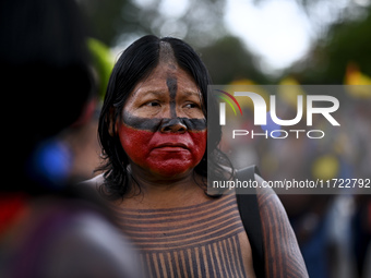 Indigenous leaders hold an act in Brasilia, Brazil, on October 30, 2024, to protest against PEC48, which defines a time frame for demarcatin...