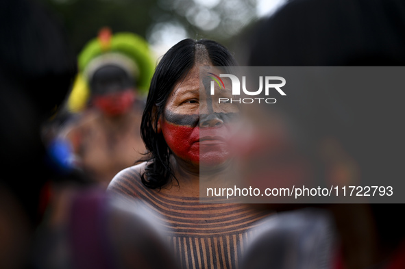 Indigenous leaders hold an act in Brasilia, Brazil, on October 30, 2024, to protest against PEC48, which defines a time frame for demarcatin...