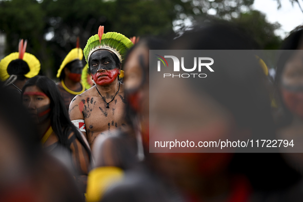 Indigenous leaders hold an act in Brasilia, Brazil, on October 30, 2024, to protest against PEC48, which defines a time frame for demarcatin...