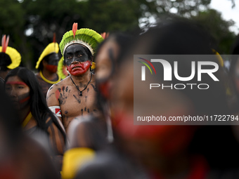 Indigenous leaders hold an act in Brasilia, Brazil, on October 30, 2024, to protest against PEC48, which defines a time frame for demarcatin...