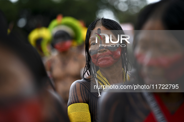 Indigenous leaders hold an act in Brasilia, Brazil, on October 30, 2024, to protest against PEC48, which defines a time frame for demarcatin...