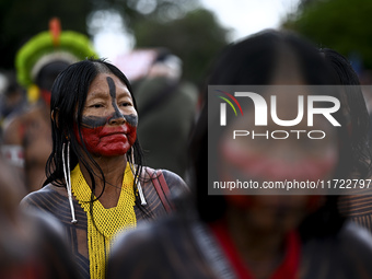 Indigenous leaders hold an act in Brasilia, Brazil, on October 30, 2024, to protest against PEC48, which defines a time frame for demarcatin...