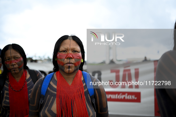 Indigenous leaders hold an act in Brasilia, Brazil, on October 30, 2024, to protest against PEC48, which defines a time frame for demarcatin...