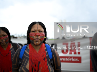 Indigenous leaders hold an act in Brasilia, Brazil, on October 30, 2024, to protest against PEC48, which defines a time frame for demarcatin...