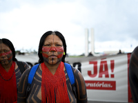 Indigenous leaders hold an act in Brasilia, Brazil, on October 30, 2024, to protest against PEC48, which defines a time frame for demarcatin...