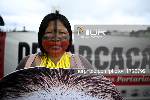 Indigenous leaders hold an act in Brasilia, Brazil, on October 30, 2024, to protest against PEC48, which defines a time frame for demarcatin...