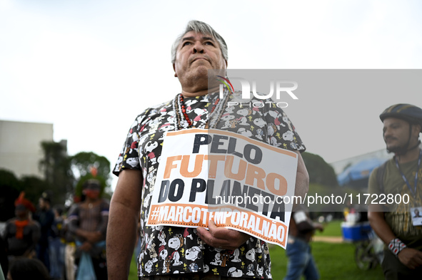 Indigenous leaders hold an act in Brasilia, Brazil, on October 30, 2024, to protest against PEC48, which defines a time frame for demarcatin...