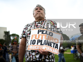 Indigenous leaders hold an act in Brasilia, Brazil, on October 30, 2024, to protest against PEC48, which defines a time frame for demarcatin...