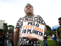 Indigenous leaders hold an act in Brasilia, Brazil, on October 30, 2024, to protest against PEC48, which defines a time frame for demarcatin...