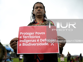 Indigenous leaders hold an act in Brasilia, Brazil, on October 30, 2024, to protest against PEC48, which defines a time frame for demarcatin...