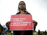 Indigenous leaders hold an act in Brasilia, Brazil, on October 30, 2024, to protest against PEC48, which defines a time frame for demarcatin...