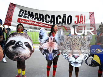 Indigenous leaders hold an act in Brasilia, Brazil, on October 30, 2024, to protest against PEC48, which defines a time frame for demarcatin...