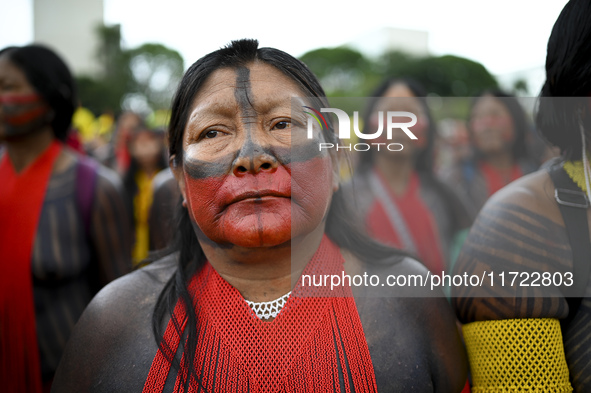 Indigenous leaders hold an act in Brasilia, Brazil, on October 30, 2024, to protest against PEC48, which defines a time frame for demarcatin...