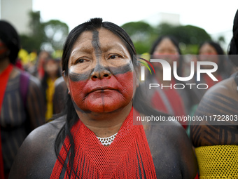 Indigenous leaders hold an act in Brasilia, Brazil, on October 30, 2024, to protest against PEC48, which defines a time frame for demarcatin...