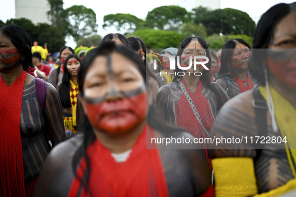 Indigenous leaders hold an act in Brasilia, Brazil, on October 30, 2024, to protest against PEC48, which defines a time frame for demarcatin...