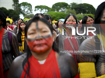 Indigenous leaders hold an act in Brasilia, Brazil, on October 30, 2024, to protest against PEC48, which defines a time frame for demarcatin...