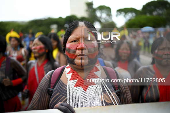 Indigenous leaders hold an act in Brasilia, Brazil, on October 30, 2024, to protest against PEC48, which defines a time frame for demarcatin...