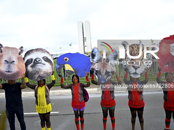 Indigenous leaders hold an act in Brasilia, Brazil, on October 30, 2024, to protest against PEC48, which defines a time frame for demarcatin...