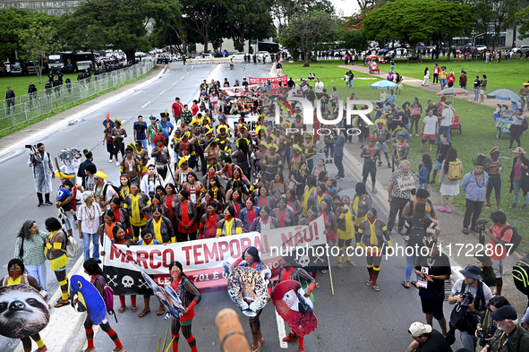 Indigenous leaders hold an act in Brasilia, Brazil, on October 30, 2024, to protest against PEC48, which defines a time frame for demarcatin...