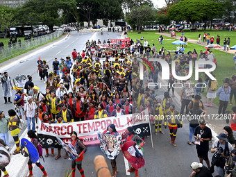 Indigenous leaders hold an act in Brasilia, Brazil, on October 30, 2024, to protest against PEC48, which defines a time frame for demarcatin...